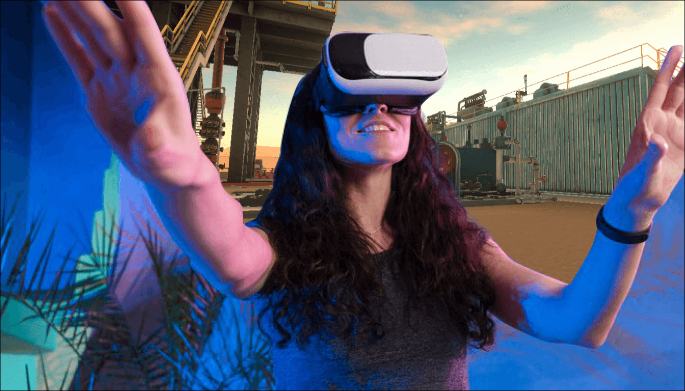A woman wearing a VR headset engages in an immersive training simulation in a realistic industrial environment