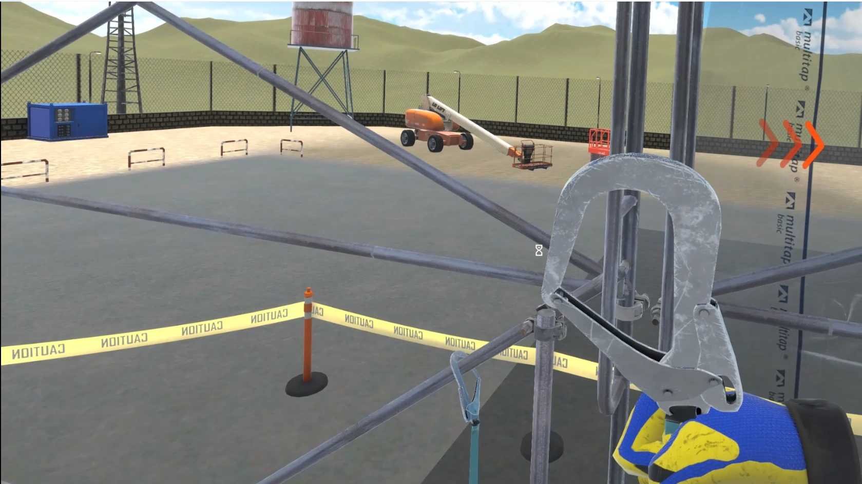 First-person view from a scaffolding structure in a construction simulation, showing a worker's gloved hand holding a metal safety hook near scaffolding pipes, overlooking an industrial yard cordoned off with yellow caution tape, featuring a boom lift and water tower in the background.